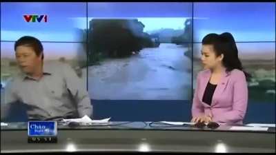 Vietnam Guy's Phone Rings and Throws It while on TV
