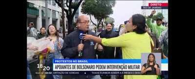 Repórter da televisão pública portuguesa é alvo de tentativa de agressão durante emissão