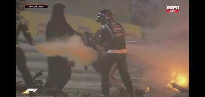 Grosjean crash with more angles. Let's pray for a fast recover.