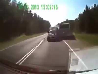 Truck crashes into bus and dashcam driver at high speed