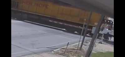 Train destroys a truck that was stuck on the tracks