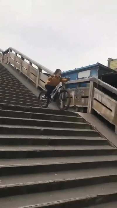 Parent of the year records daughter using her bike ( and helmet ) properly