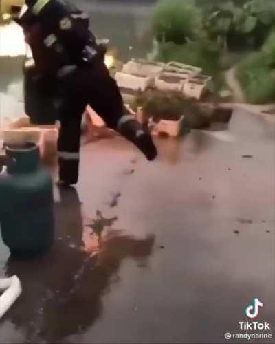 Tossing a lit propane cylinder that could explode at any moment