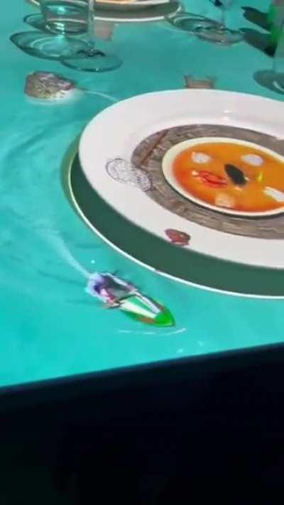 In a restaurant in Italy diners enjoy a video mapping on the table while they wait