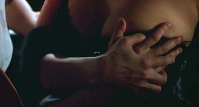 Wife Jennifer Tilly can't stop thinking about her new neighbor Gina Gershon, so she slowly seduces her back to the apartment for some fingering session before her husband arrives in Bound (1996)