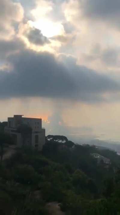 (Not in mega thread) Look at light passing through the clouds right before the shock wave arrives.