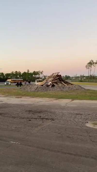 To safely start a school bonfire.