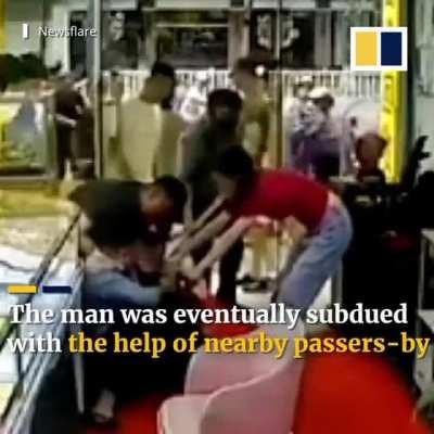 Robber gets taken down.