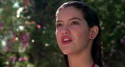 Phoebe Cates takes off bikini top
