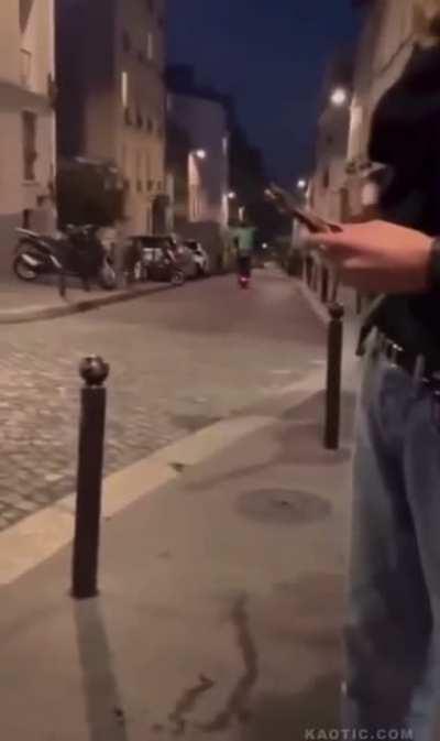 Trying to fit three people on a scooter