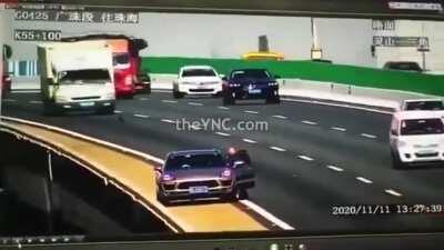 Moron in China leaves his car jack on the road which causes a massive accident.