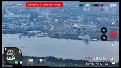This morning, Russian forces attacked Kherson using MLRS. The scatter of the projectiles was so wide that some of the rockets fell into the water/onto empty fields. Russia POV drone. 24.10.2025