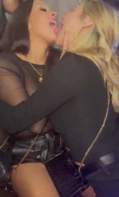 Christen& Whitney kissing 