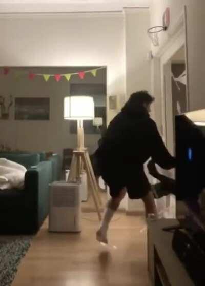 WCGW Basketball rim over a glass door