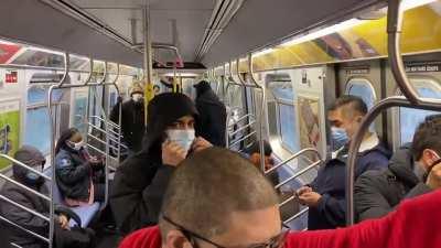 In one car you have a somewhat drunk man trying to chat with new NYC Mayor, another person yelling at him and someone else sleeping in the train.