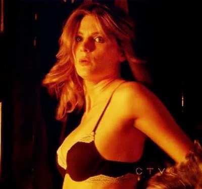 Stana Katic undressing