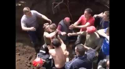 Young Boy Bravely Volunteers To Save Child Trapped Down Pipe