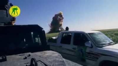 Guy almost hit by a shrapnel after a car exploded in Iraq