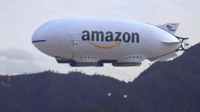 Amazon blimp releasing drones