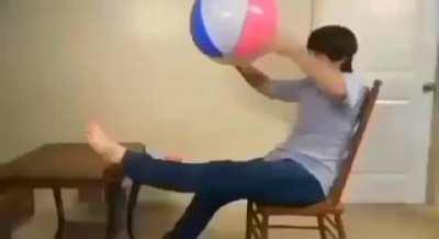 I hope this really heavy beach ball doesn't break my leg