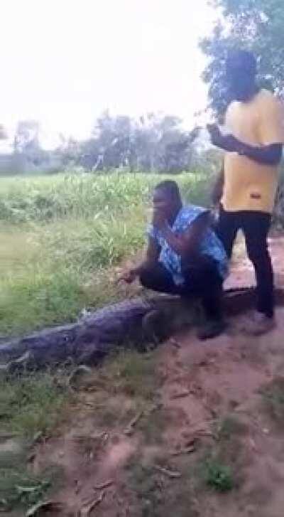 Taking selfies with a crocodile