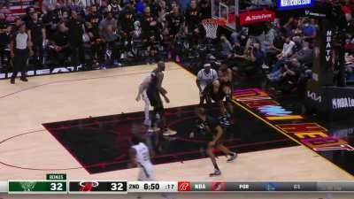 [Highlight] Caleb Martin meets Bobby Portis at the rim!