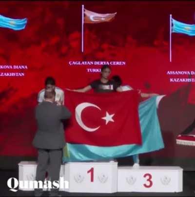 Turkish and Kazakhstani athletes argue about flags on the podium
