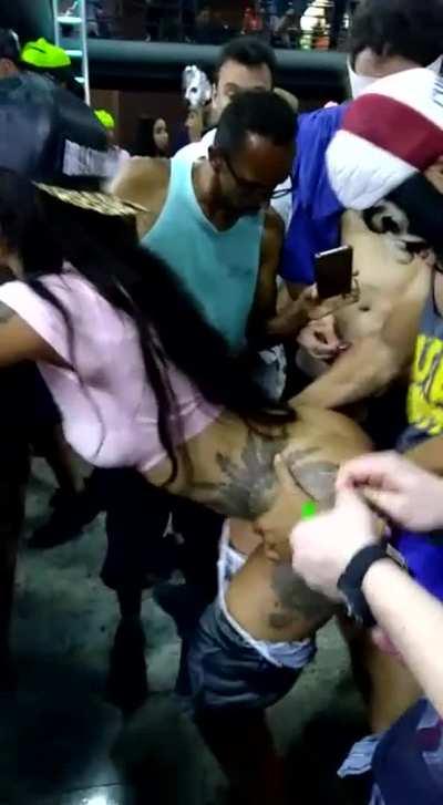 People taking turns for festival cunt