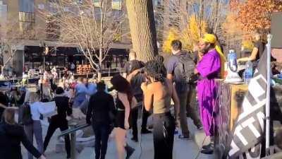 During post election celebrations a man without a mask sucker punched a Biden supporter and is immediately arrested