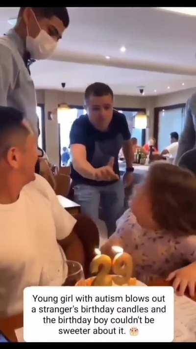 Young girl with autism blows out a stranger's birthday candles and the birthday boy couldn't be a kinder man