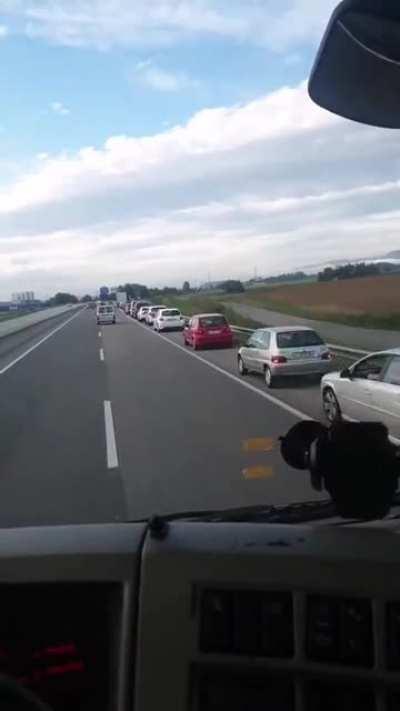 A bunch of idiots thought that the hard shoulder was the exit lane and started piling up behind a truck...