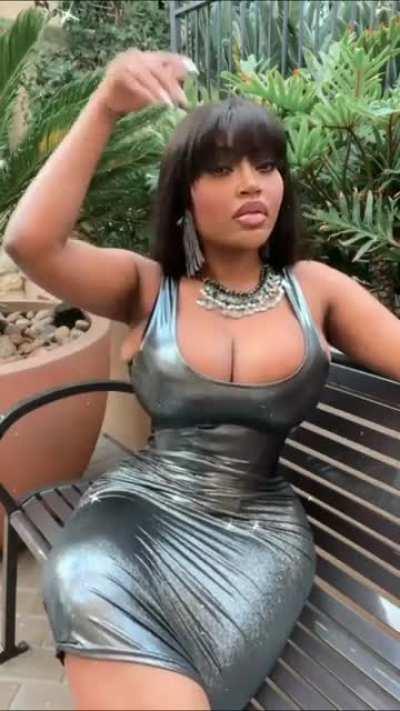 Titties about to rip that dress open