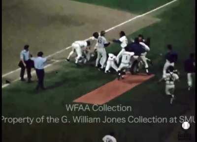 Lenny Randle drops a bunt just so he can destroy the pitcher