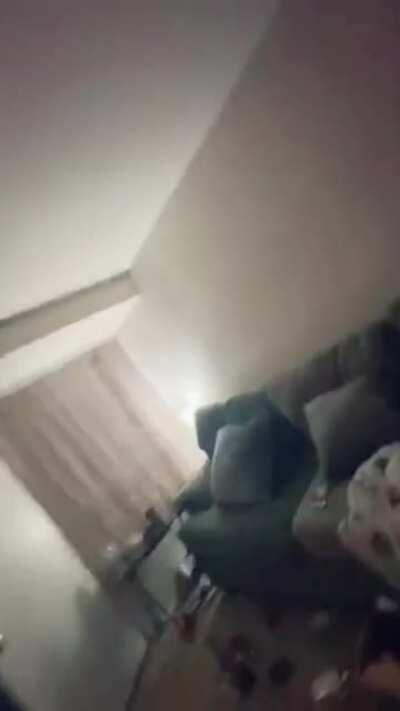 Woman is recording her self dancing when a stalker climbs her second story balcony to break in.