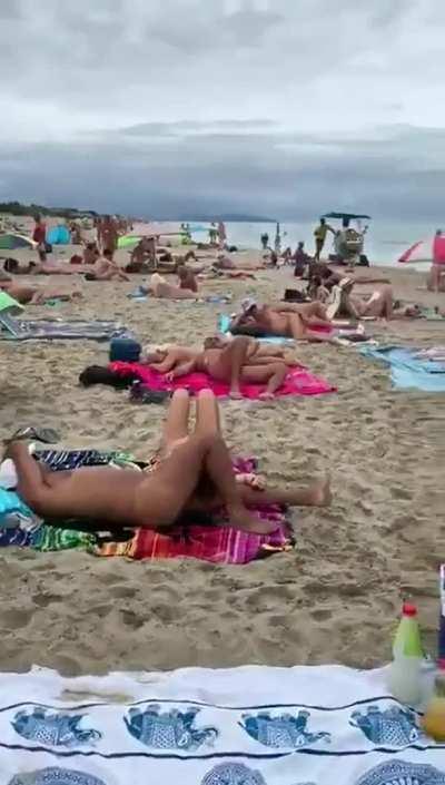 Shameless blowjob on a beach