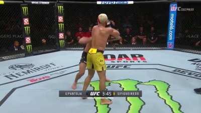 Deiveson Figueiredo nearly decapitates Alexandre Pantoja with an uppercut, continues with a barrage of elbows