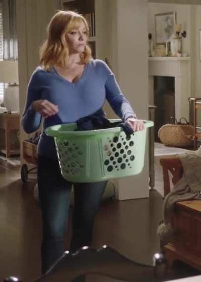 Blue sweater doing laundry