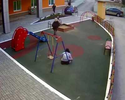 two creatures pissing on children's playground