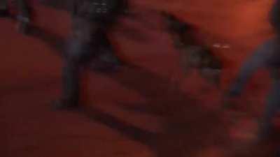 Buffalo, NY: police arrest a man *while he's being interviewed by the press* *with his hands in the air* Lawlessness