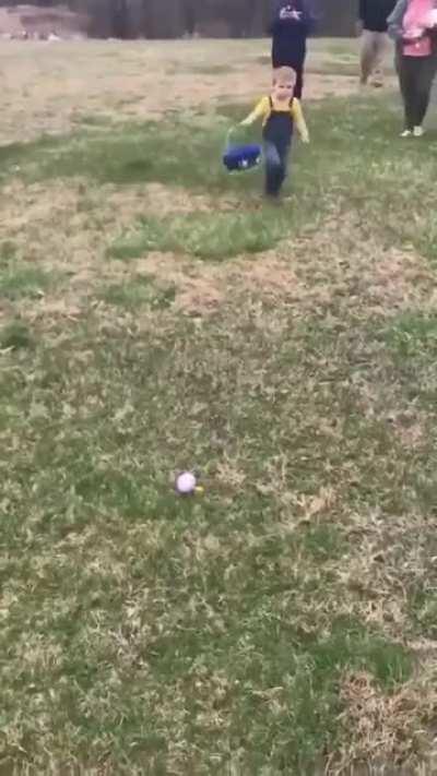 Just a kid collecting Easter eggs