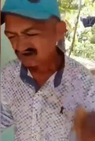 Old man eats a spider