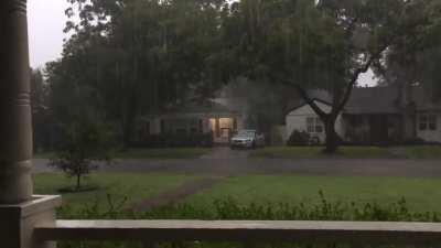 Enjoying the rain from my front porch.