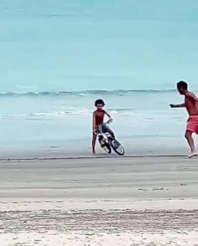 A heart melting moment of a father teaching his son how to ride a bicycle. I live for these moments