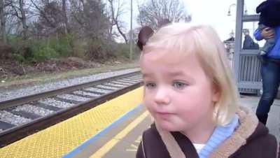 A little girl seeing a train for the first time!