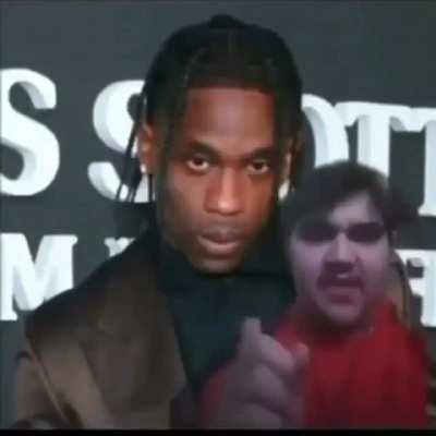 Holy shit he looks just like Travis Scott