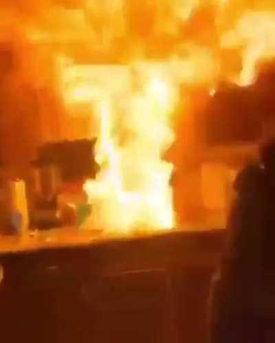 To pour water on burning oil