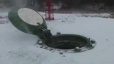 A Rocket getting launched out of a missile silo. (Turn down your volume)