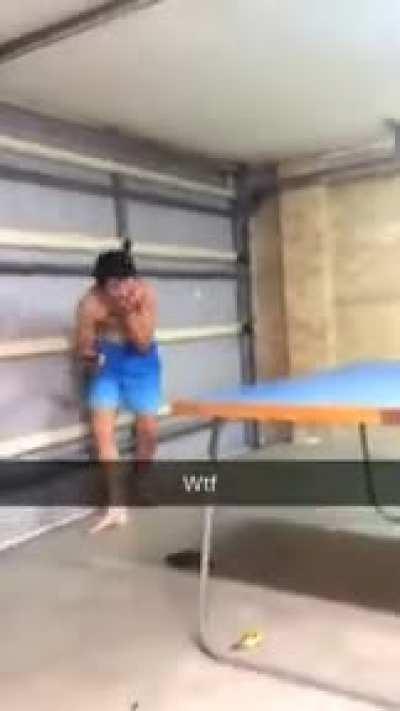 Kid in underwear throws ping pong paddle at his brother