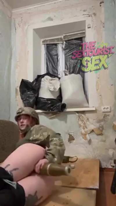 Soldier girl fucks herself with mortar shell