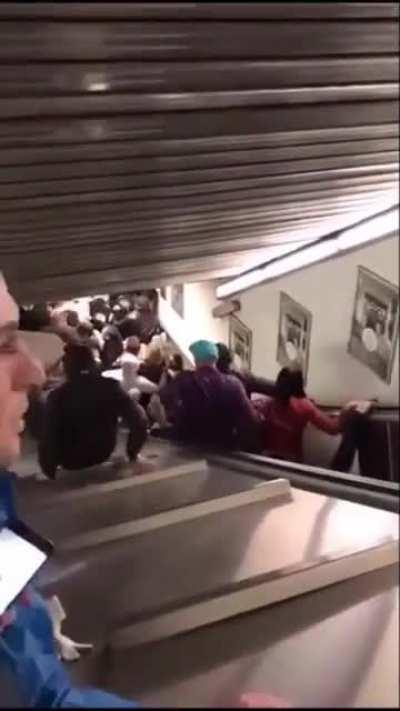 Crowded escalator fails